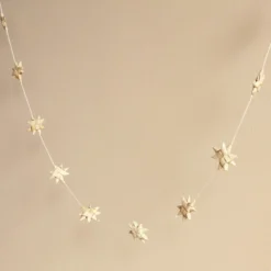 Afroart Natural Stars On A String Garland -Jellycat Christmas Store afroart natural stars string garland 0v8a7531 900x900 1