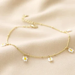 Beaded Daisy Satellite Chain Anklet In Gold 10 Beaded Daisy Satellite Chain Anklet In Gold -Jellycat Christmas Store daisy beaded satellite chain anklet gold 4x3a3395 900x900 1