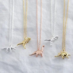 Rose Gold Diplodocus Dinosaur Necklace -Jellycat Christmas Store dinosaur charm charm necklaces o21a7049 900x900 1