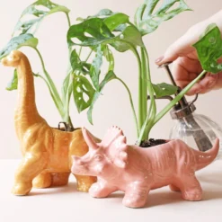 Mustard Diplodocus Dinosaur Planter -Jellycat Christmas Store dinosaur planter 4x3a0807 900x900 1