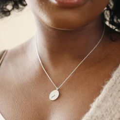 Enamel Birth Flower Necklace In Silver 12 Enamel Birth Flower Necklace In Silver -Jellycat Christmas Store enamel birth flower necklace silver daffodil 4x3a6713 2 900x900 1