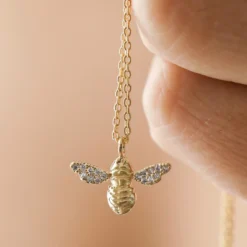 Estella Bartlett Cubic Zirconia Bee Pendant Necklace In Gold 8 Estella Bartlett Cubic Zirconia Bee Pendant Necklace In Gold -Jellycat Christmas Store estella bartlett cubic zirconia bee pendant necklace gold 4x3a7355 900x900 1