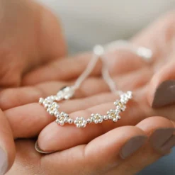 Estella Bartlett Daisy Chain Amelia Bracelet In Silver 7 Estella Bartlett Daisy Chain Amelia Bracelet In Silver -Jellycat Christmas Store estella bartlett daisy chain amelia bracelet silver 4x3a7275 900x900 1