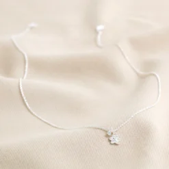 Estella Bartlett Paw Pendant Necklace In Silver -Jellycat Christmas Store estella bartlett paw pendant necklace silver 0v8a3027 900x900 1