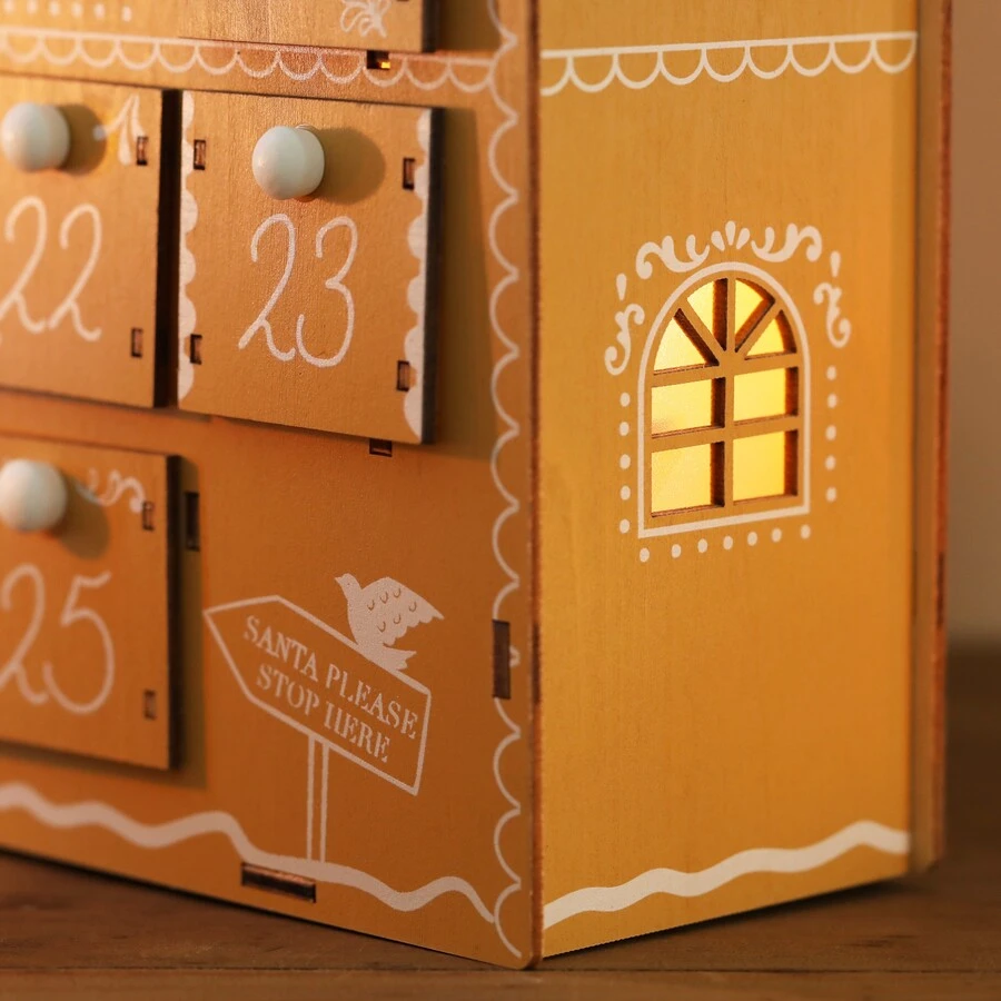 Personalised Wooden Gingerbread House LED Advent Calendar 7 Personalised Wooden Gingerbread House LED Advent Calendar - Image 5