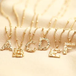 Hammered Initial Charm Necklace In Gold -Jellycat Christmas Store hammered initial charm necklace gold o21a0665 900x900 1