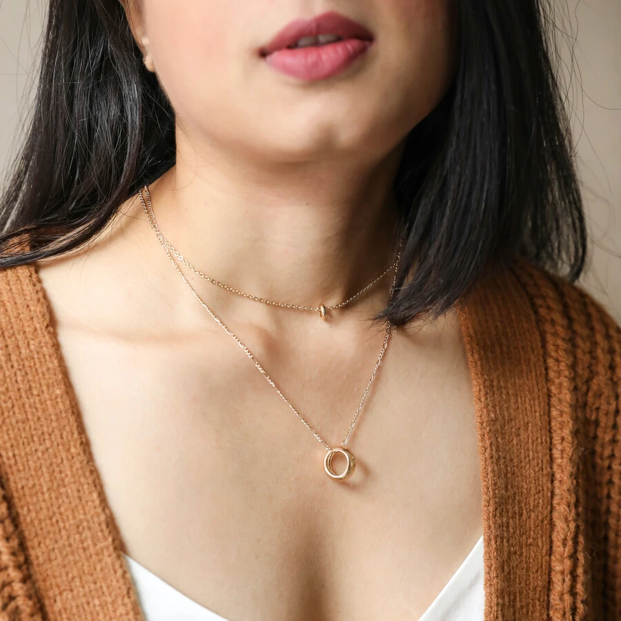 Layered Ring Pendant Necklace In Gold 6 Layered Ring Pendant Necklace In Gold - Image 4