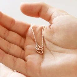 Mixed Metal Tiny Interlocking Hearts Necklace In Silver -Jellycat Christmas Store mixed metal tiny interlocking hearts necklace 4x3a2770 900x900 1