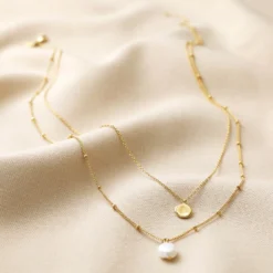 Pearl And Disc Layered Pendant Necklace In Gold 7 Pearl And Disc Layered Pendant Necklace In Gold -Jellycat Christmas Store pearl disc layered pendant necklace gold 4x3a5399 900x900 1