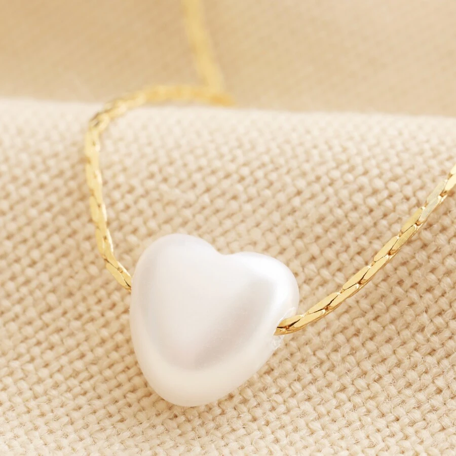 Pearl Heart Charm Necklace In Gold 3 Pearl Heart Charm Necklace In Gold