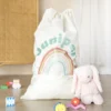 Personalised Rainbow Large Drawstring Storage Sack 1 Personalised Rainbow Large Drawstring Storage Sack -Jellycat Christmas Store personalised rainbow large drawstring storage sack 443a0960 1 900x900 1