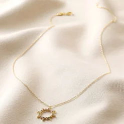 Rainbow Crystal Sunburst Pendant Necklace In Gold 11 Rainbow Crystal Sunburst Pendant Necklace In Gold -Jellycat Christmas Store rainbow crystal sunburst pendant necklace gold 4x3a9619 900x900 1