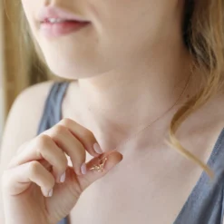 Rose Gold Diplodocus Dinosaur Necklace -Jellycat Christmas Store rose gold diplodocus charm necklace 4x3a0355 900x900 1