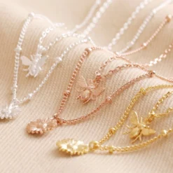 Set Of 2 Daisy And Bee Necklaces In Gold -Jellycat Christmas Store set 2 daisy bee necklaces 4x3a5676 900x900 1