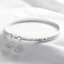 'Sisters' Meaningful Word Bangle In Silver