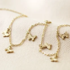 Gold Stainless Steel Butterfly Necklace -Jellycat Christmas Store stainless steel butterfly necklace in gold 0v8a7408 900x900 1