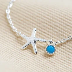 Starfish And Blue Gem Charm Anklet In Silver -Jellycat Christmas Store starfish blue gem charm anklet silver o21a3537 900x900 1