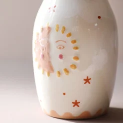 Sun And Moon Face Ceramic Posy Vase, H13.5cm 9 Sun And Moon Face Ceramic Posy Vase, H13.5cm -Jellycat Christmas Store sun moon face ceramic posy vase 4x3a1524 900x900 1