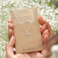 Tiny Butterfly Pendant Necklace In Silver 12 Tiny Butterfly Pendant Necklace In Silver -Jellycat Christmas Store tiny butterfly pendant necklace silver 0v8a1004 900x900 1