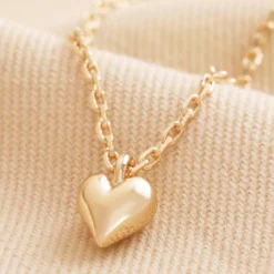 Tiny Heart Pendant Necklace In Gold