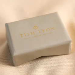 Tish Lyon Solid White Gold Tiny Crystal Trinity Nose Stud -Jellycat Christmas Store tish lyon packaging 4x3a6419 900x900 1